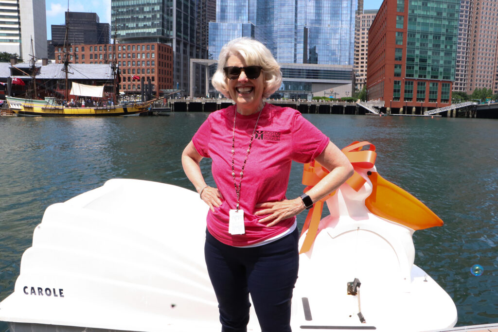 Carole getting a pelican paddle boat named in her honor
